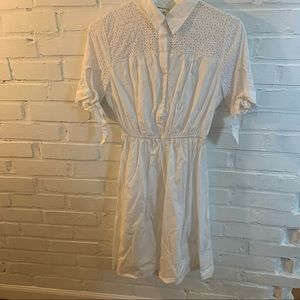 Monetary white dress with sleeves